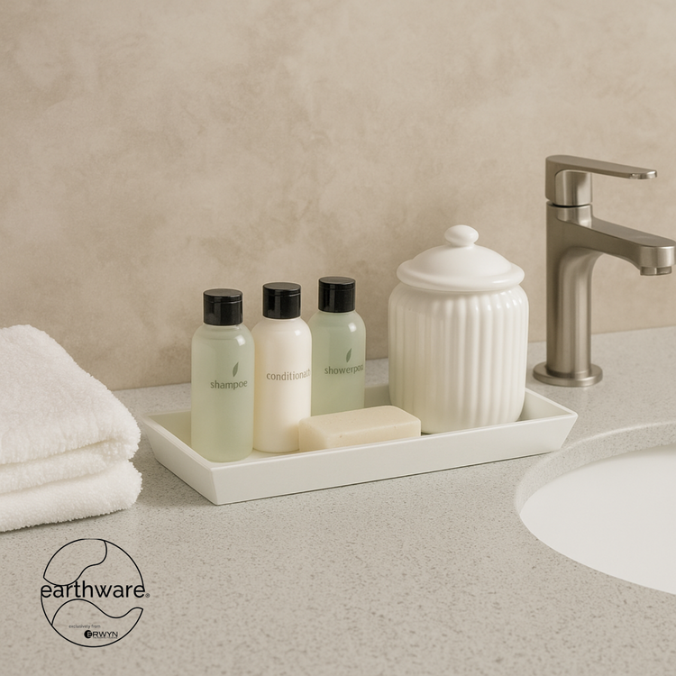 White | Amenity Tray on Bathroom counter with toiletries and a towel, featuring the earthware brand.