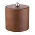 Walnut | Brown textured container with a silver lid on a white background