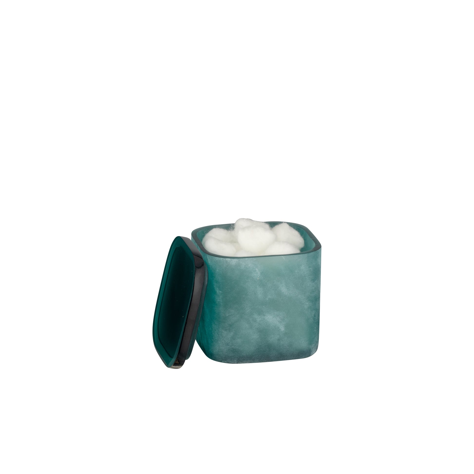 Turquoise | A small square teal container with a matching lid leaning against it, shown open with white cotton balls or a similar soft white material inside, on a plain white background.