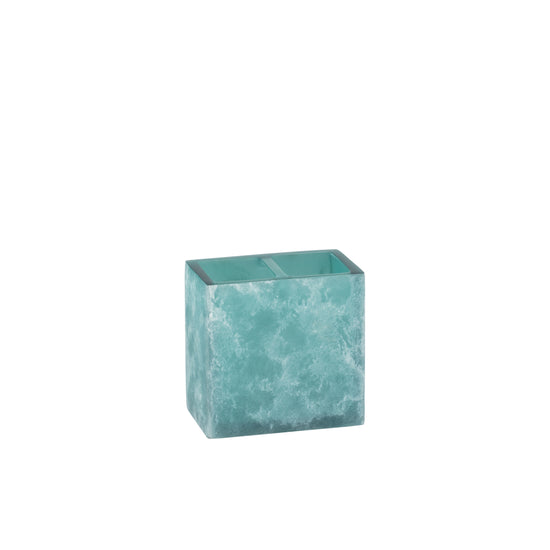 Turquoise | A square resin toothbrush holder with a brushed aqua and teal pattern, shown on a plain white background.