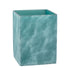 Turquoise | A square-shaped teal resin wastebasket with a textured, ocean wave-like pattern, shown on a plain white background.