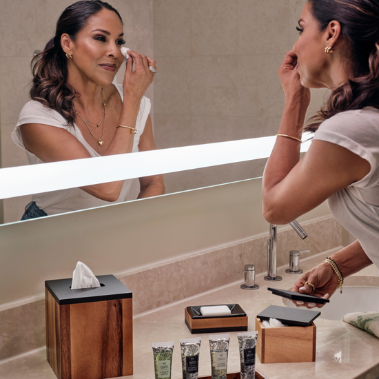 Acacia | Taniya Nayak using the Acacia wood bath accessory set.